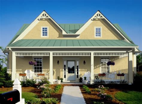 green metal roof on bsrn shaped house|forest green metal roof.